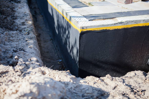 Professional Exterior Waterproofing technician working in Universal, IN